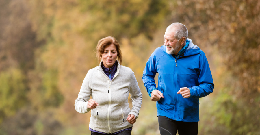 Older couple jogging together