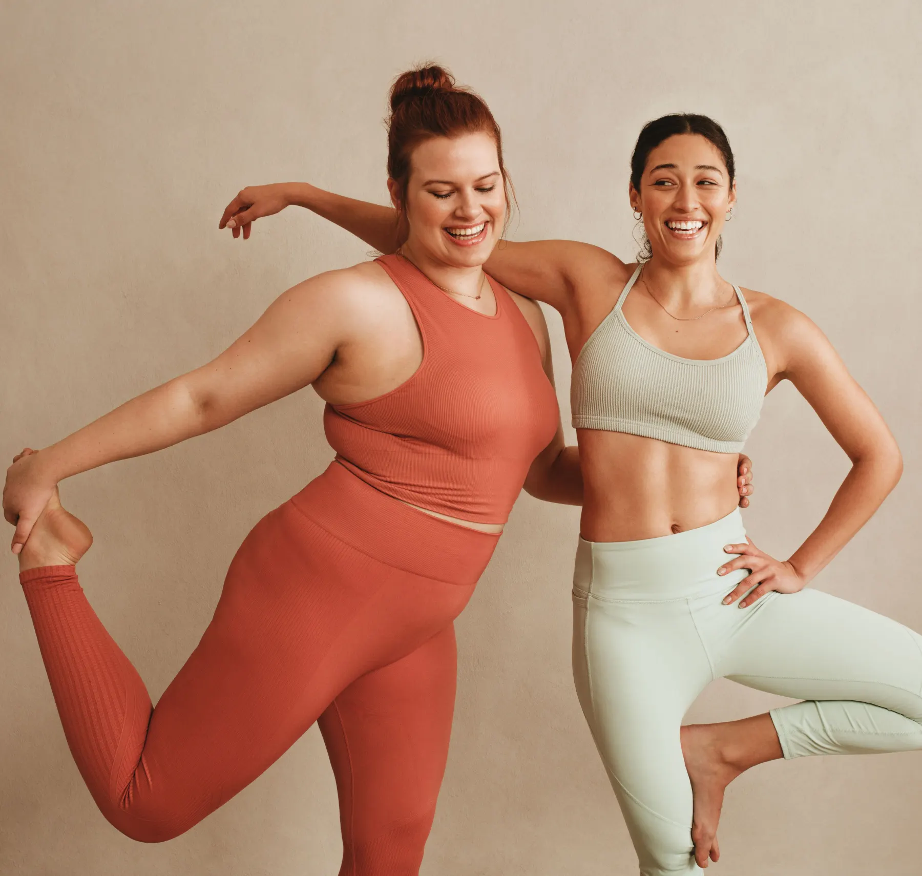 two healthy women exercising together